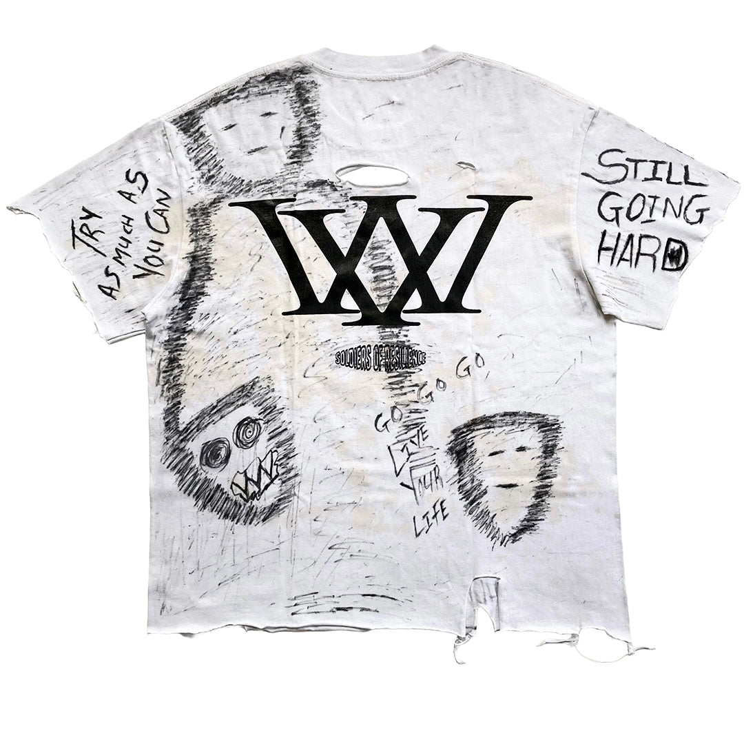 A distressed white graphic t-shirt featuring a large black 'WW' logo on the chest, surrounded by hand-drawn sketch illustrations and handwritten text on both sleeves, laid flat against a white background.