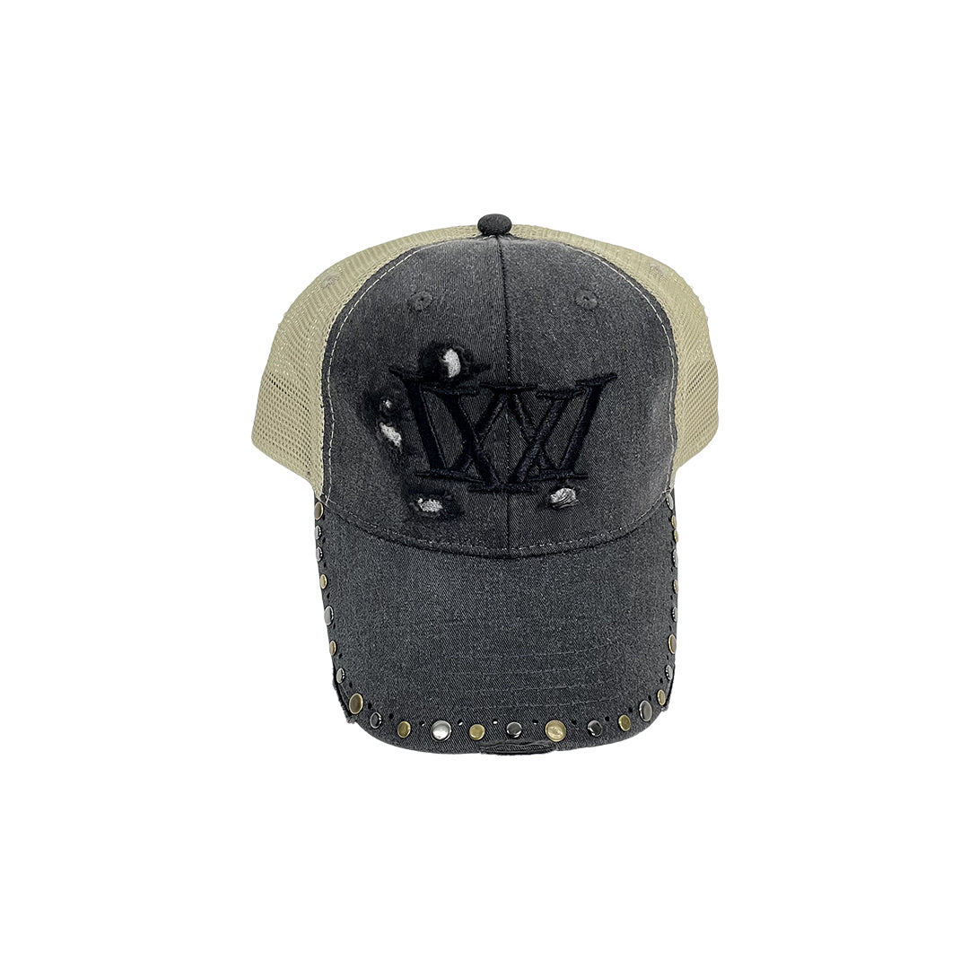 Gray and beige cap with decorative elements on a white background