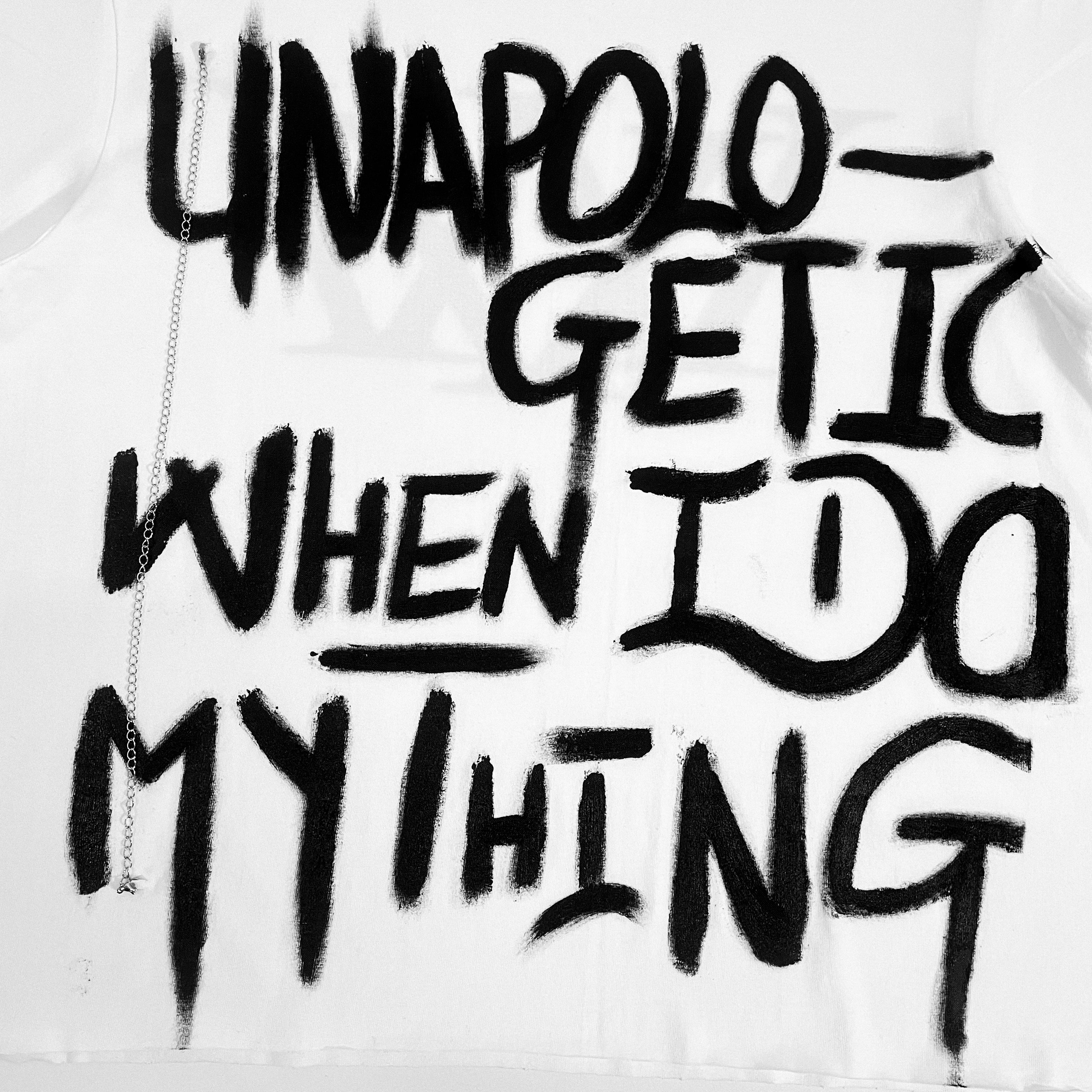 Text 'UNAPOLOGETIC WHEN I DO MY THING' Hand-painted on a white background