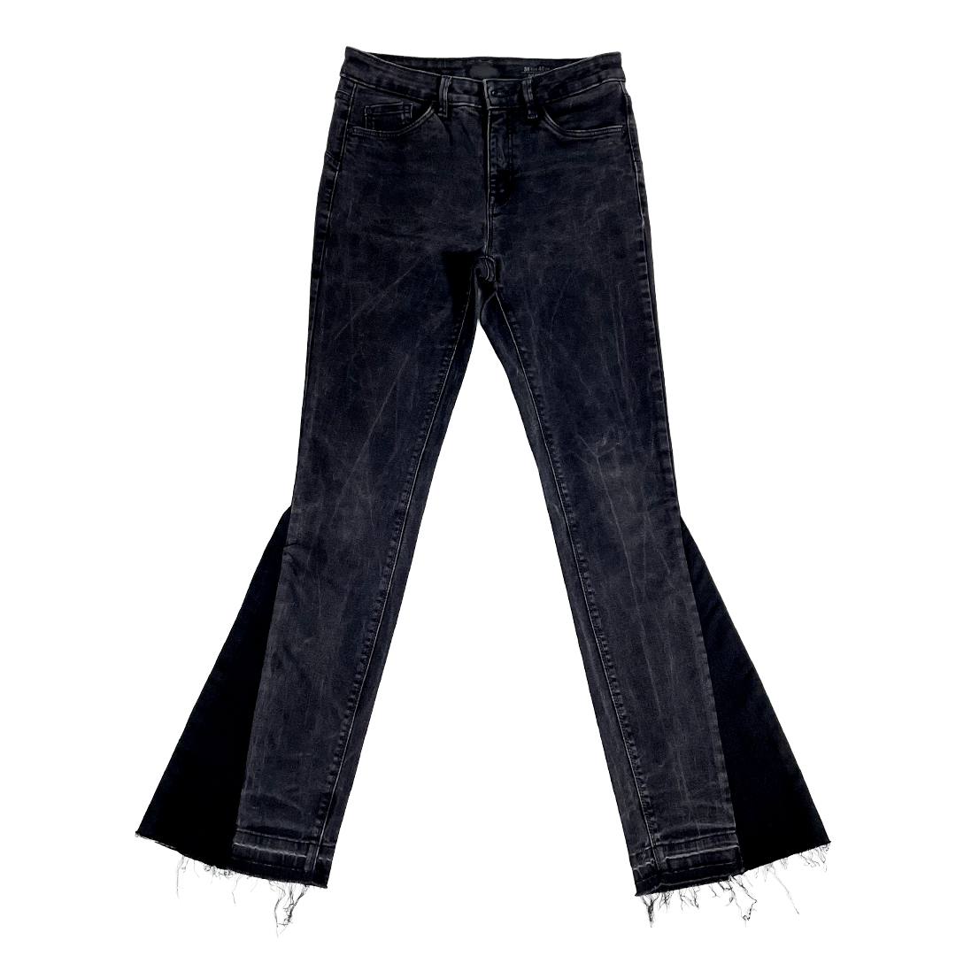 Black flared jeans on a white background