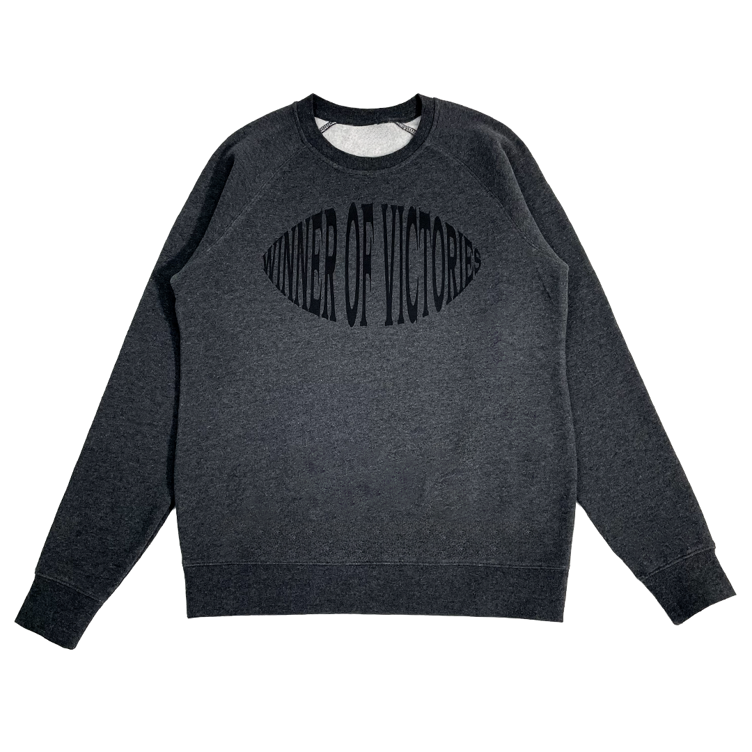 Dark gray sweatshirt with 'Winner of Victories' text on a white background