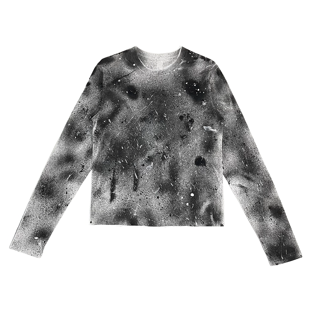 Black and white splatter patterned long-sleeve Tee on a white background